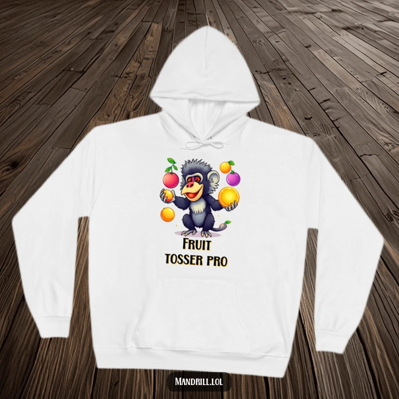 Funny Mandrill Hoodie: A mandrill with striking colors juggles colorful, glowing fruits, bringing vibrant, humorous warmth.